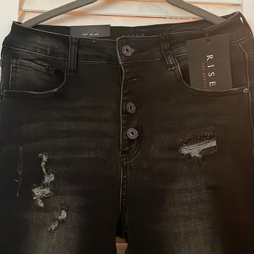 NWT Risen jeans. Size 9/29. Button fly with distressing and frayed hem